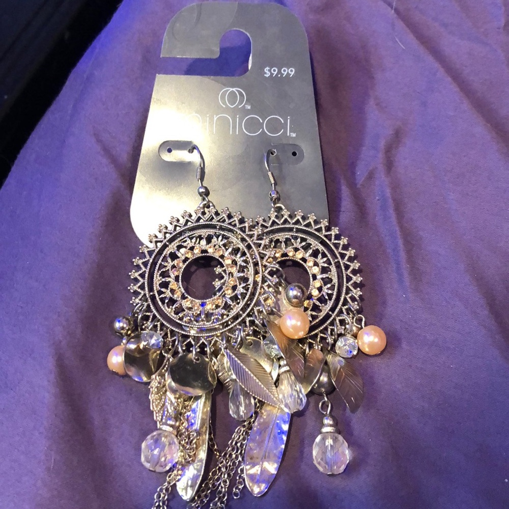 ‼️‼️never worn before feather earrings‼️‼️